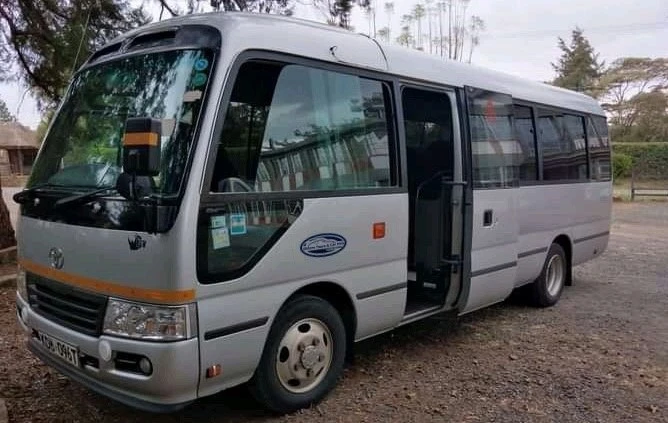 Spacious Coaster Bus for group travel available at Eldoret airport