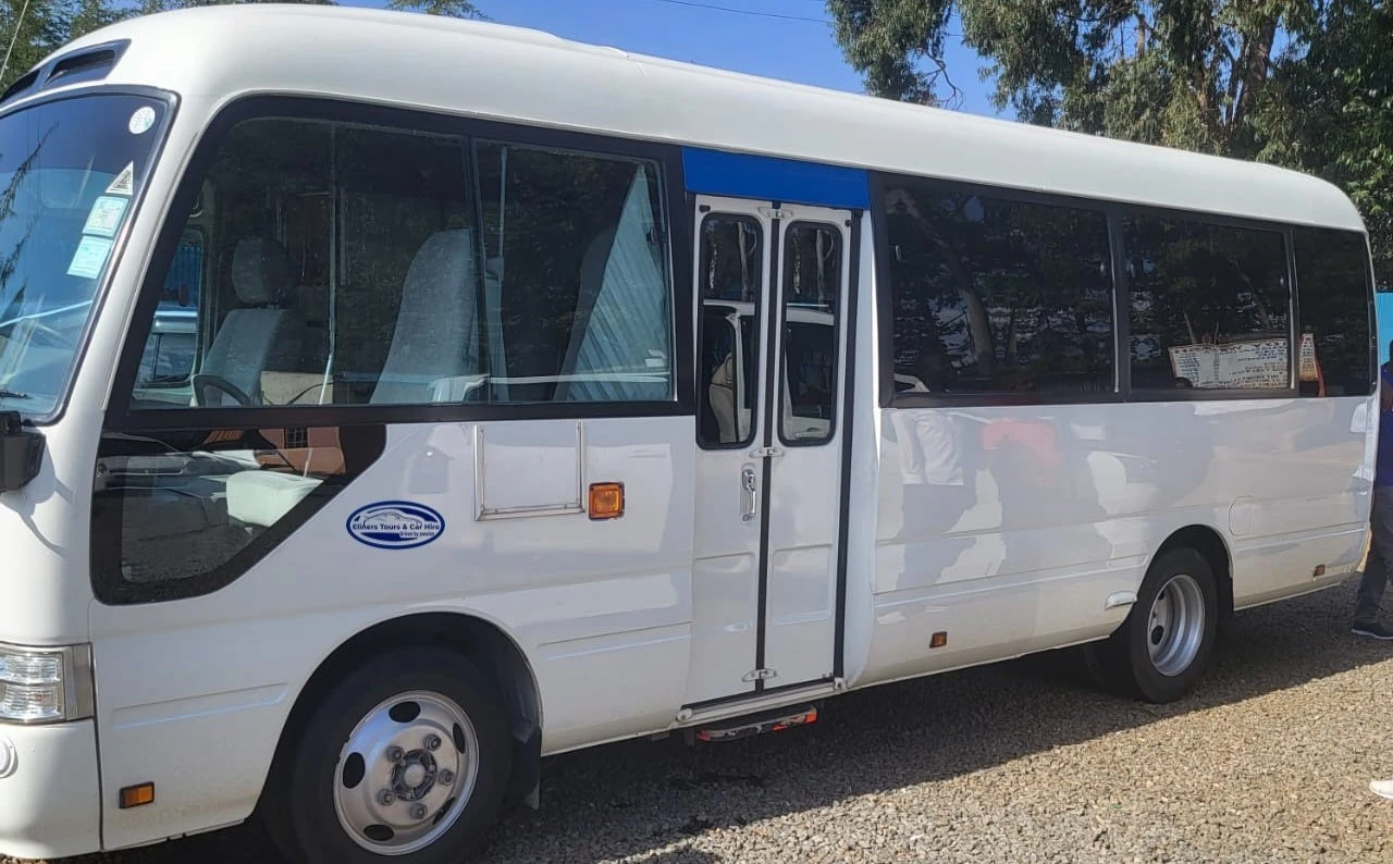 Coaster Bus 22-Seater for hire in Eldoret - Spacious and reliable transport for group travel, school trips, corporate events, and weddings.