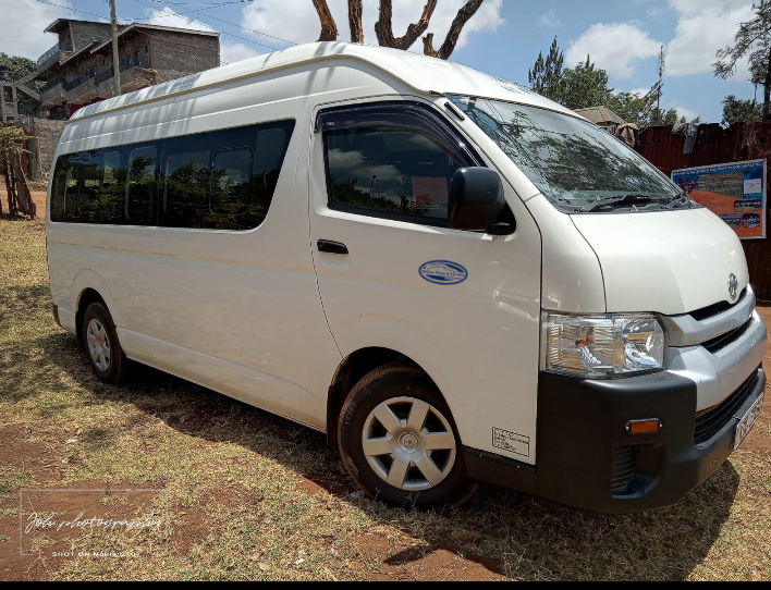 14-Seater Van parked at Eldoret Airport, ideal for group travel