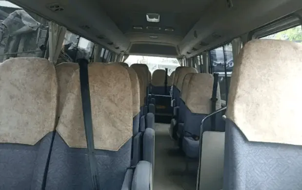 Hire a modern Coaster Bus with AC for comfortable travel in Eldoret